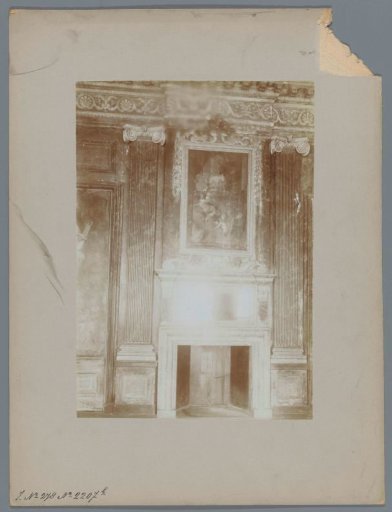 Fireplace with a mirror and a painting in a house at the Noordeinde in The Hague