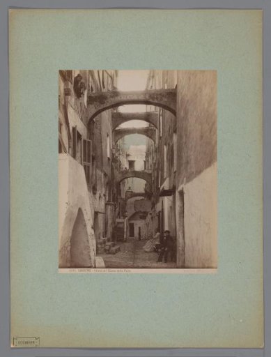 Street view with a few people in San Remo, Italy