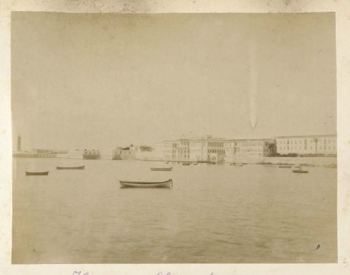 Port of Alexandria with rowboats off the coast