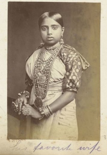 Portrait of a Young Woman Dressed in a Sari and Adorned with Jewelry