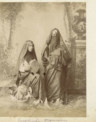 Studio portrait of two veiled women