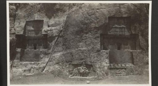 Rock with bas-reliefs and entrances to tomb chambers at Naks-i-Rustam, Persia