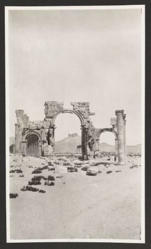 Ruin of the entrance to the main colonnaded street at Palmyra, Syria
