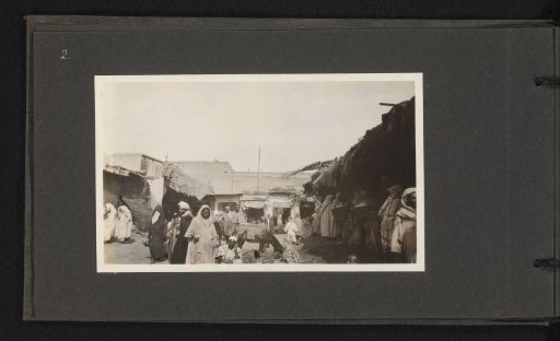 Small square with people in the Souks of Marrakech