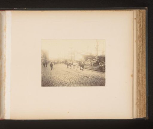 Horses and people on a quay