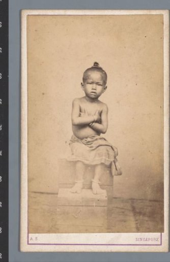 Studio portrait of an Asian child with bare upper body