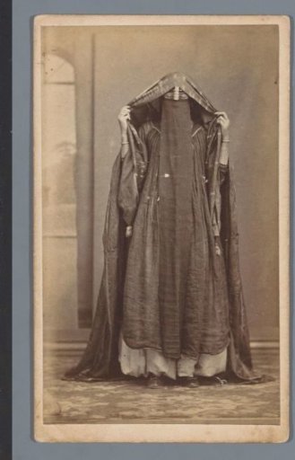 Portrait of a veiled Arab woman