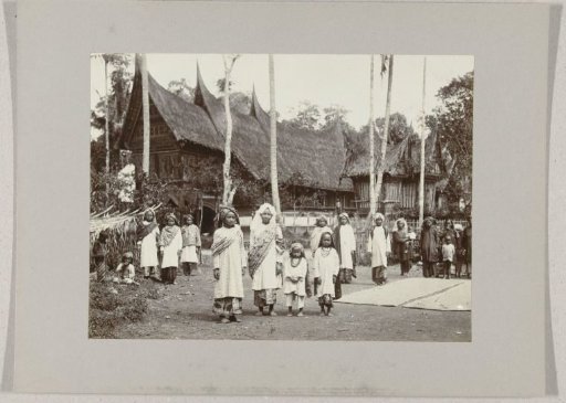 Women and children before a Minangkabau house on Sumatra