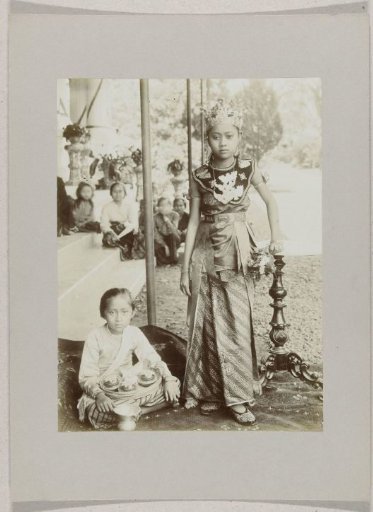Portrait of a girl in festive dress in the Dutch East Indies