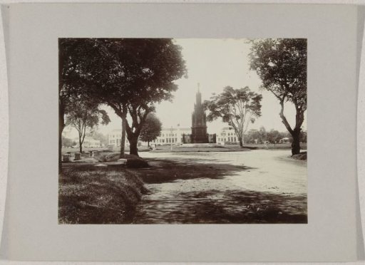 Waterlooplein with the Michiels Monument in Batavia (Jakarta), viewed from the Willemslaan, with the Palace of Daendels in the background, Dutch East Indies