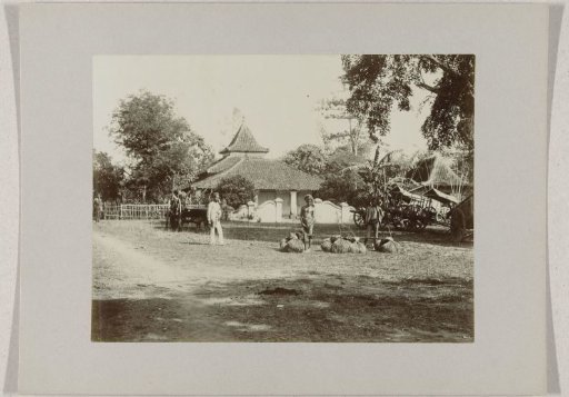 Men near a house in Bandung