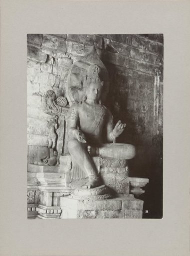 Image of one of the two royal sons in the Mendoet Temple south of Magelang, Dutch East Indies