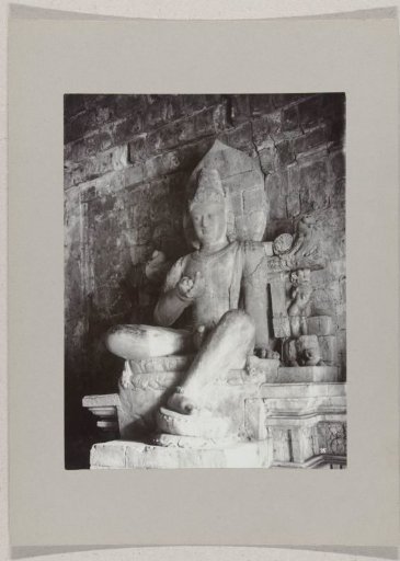 Image of one of the two royal sons in the Mendoet Temple south of Magelang, Dutch East Indies