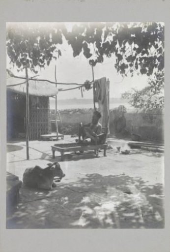 Fakir sitting on a bed of nails, Varanasi, Uttar Pradesh, India