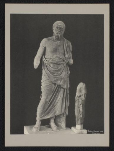 Statue of a standing bearded man
