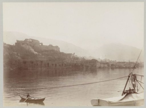 Norwegian coastal town seen from a passing ship