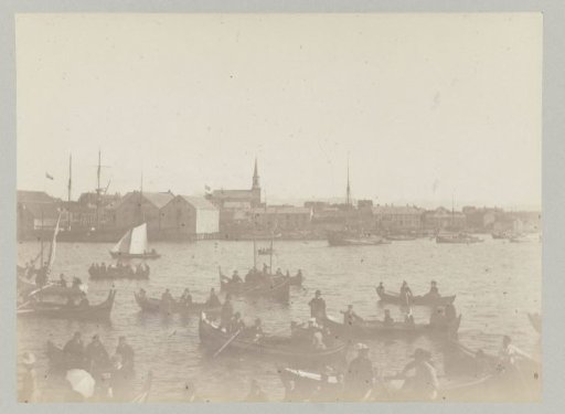 The ship Hohenzollern surrounded by full rowboats in a harbor