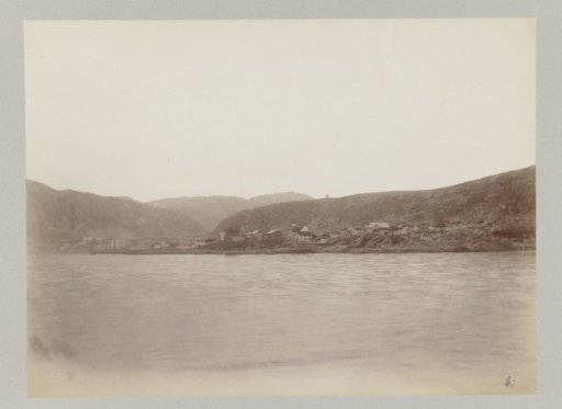 Coastal town in Norway seen from the water