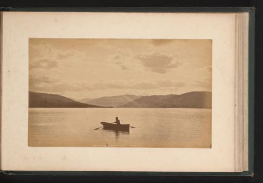 Man in a rowing boat at Loch Katrine