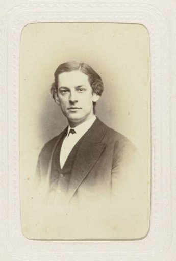 Studio portrait of a young man with a parting in his hair