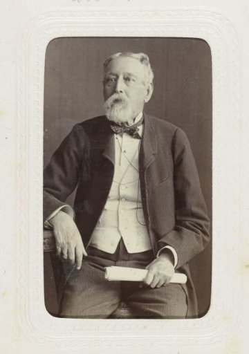 Studio portrait of an elderly man with beard and mustache