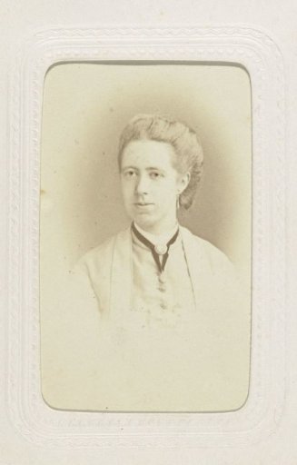 Studio portrait of a woman with her hair up