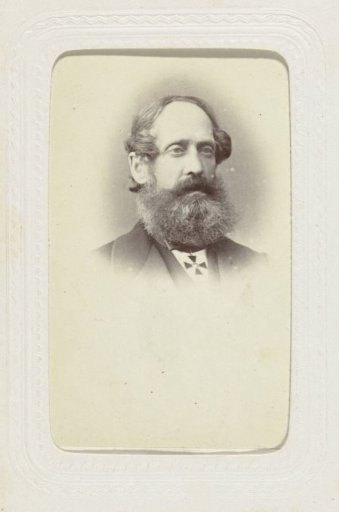 Studio Portrait of a Man with a Mustache and Beard, Wearing an Insignia Around His Neck