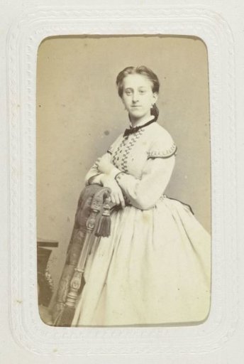 Studio Portrait of a Woman by a Chair