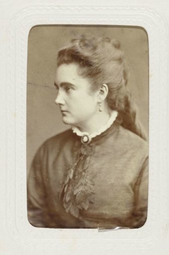 Studio Portrait of a Woman in a High-Closed Black Dress