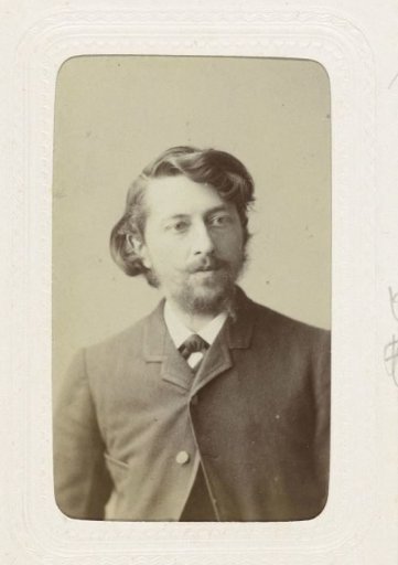 Studio portrait of a young man with half-long hair