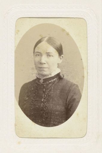 Studio portrait of a woman with her hair up