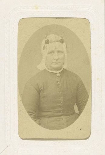 Studio portrait of a woman in North Holland traditional dress