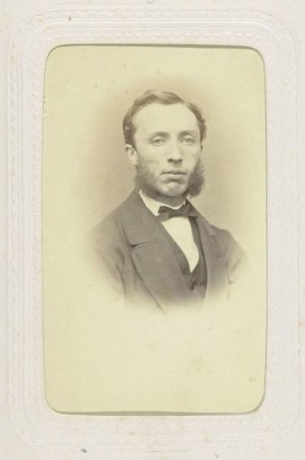 Studio portrait of a man in a costume with large sideburns