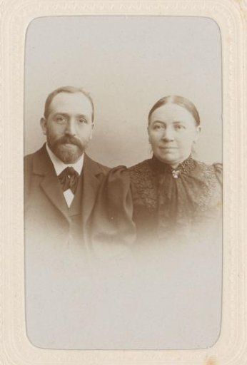 Studio portrait of a married couple dressed in black