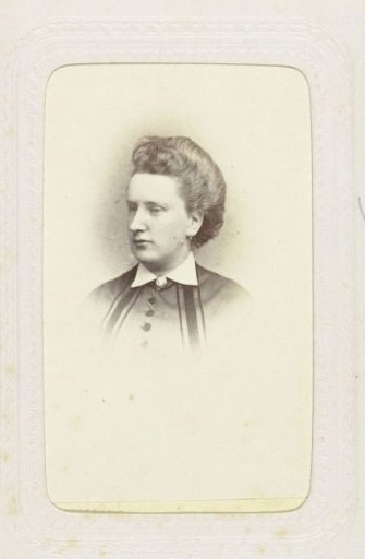 Studio portrait of a woman with her hair up