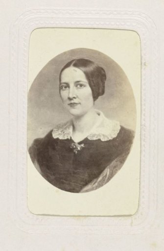 Painted oval portrait of a woman with her hair up