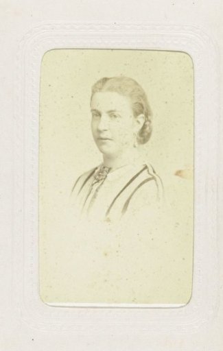 Studio portrait of a woman with her hair up