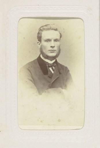 Studio portrait of a young man with a beard