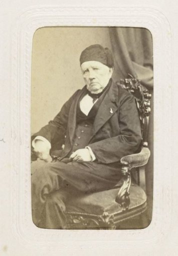Portrait of an older man with a hat