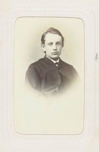 Studio Portrait of a Young Man with Overcoat