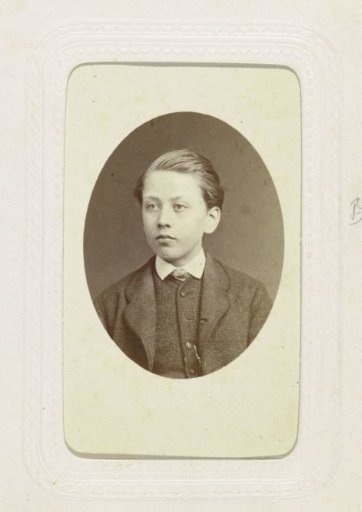 Studio Portrait of a Boy in a Suit