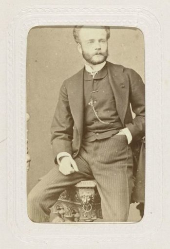 Studio portrait of a man with a mustache and beard