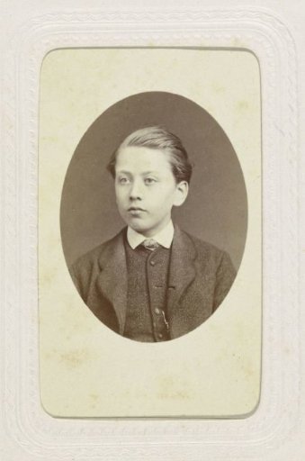Studio portrait of a boy in a suit