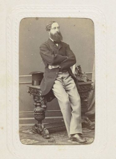 Studio portrait of a man with a long beard