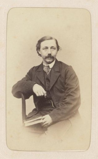 Studio portrait of a man with a mustache
