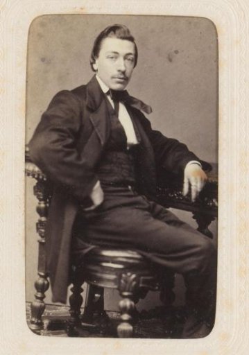 Studio portrait of a man with a mustache