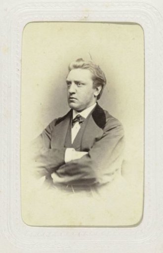 Studio portrait of a man looking to the right in costume
