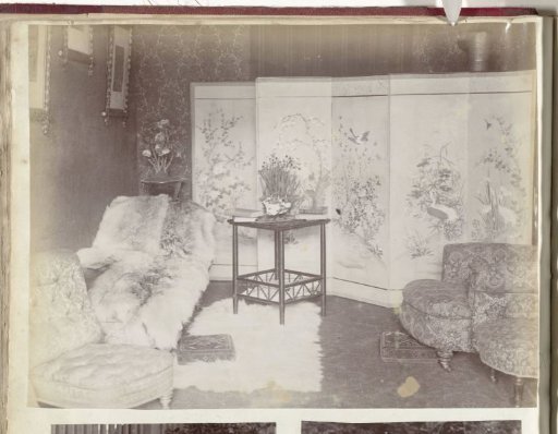 Interior with room screen, side tables and chairs