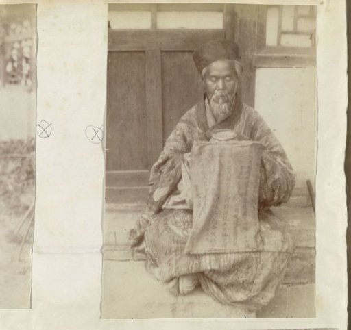Portrait of a Chinese Man Reading, Possibly a Priest