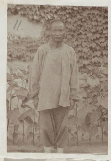 Portrait of a Chinese Man in Work Clothes